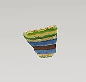 Glass striped mosaic bowl fragment by Unknown Artist