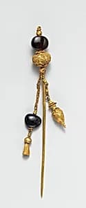 Gold and garnet pin by Unknown Artist
