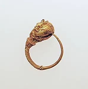 Gold earring with woman's head by Unknown Artist