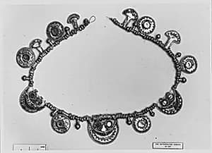 Gold necklace with inlaid amber by Unknown Artist