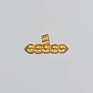Gold pendant by Unknown Artist