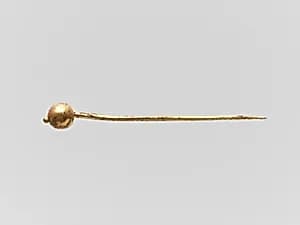 Gold pin by Unknown Artist