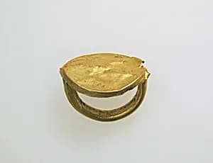 Gold ring with elliptical bezel by Unknown Artist