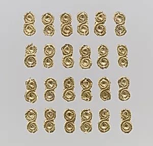 Gold sheet appliques by Unknown Artist
