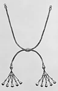 Gold slipknot strap necklace by Unknown Artist