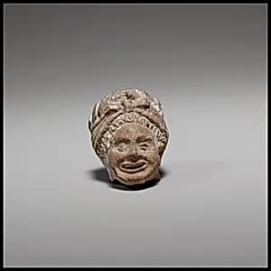Head of a comic figurine by Unknown Artist