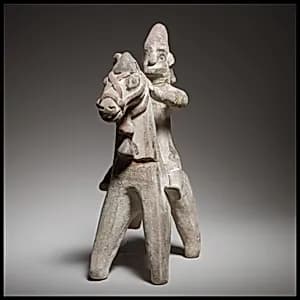 Horse and rider figurine by Unknown Artist