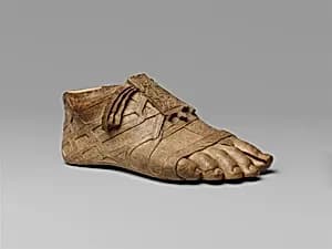 Ivory sandaled foot by Unknown Artist