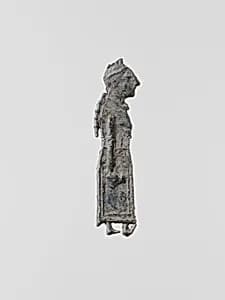 Lead figure of a woman by Unknown Artist
