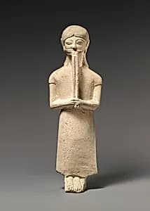 Limestone flute-player by Unknown Artist