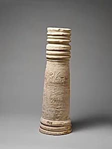 Limestone funerary cippus by Unknown Artist