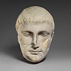 Limestone male head by Unknown Artist