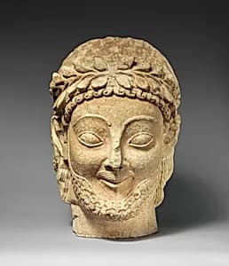 Limestone male head by Unknown Artist
