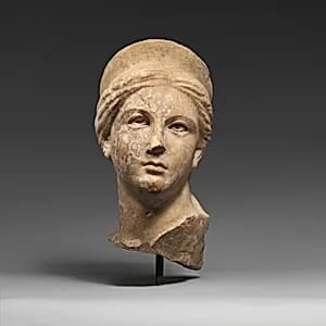 Marble head of a goddess by Unknown Artist