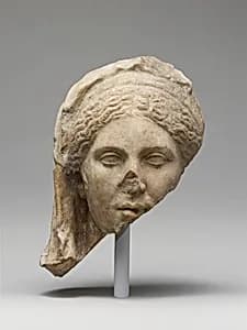 Marble head of a woman by Unknown Artist