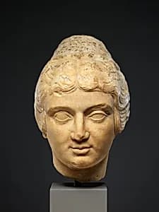 Marble head of a woman by Unknown Artist