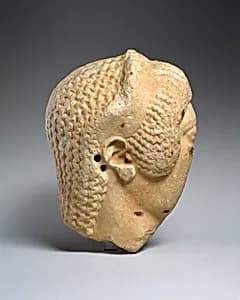 Marble head of a woman by Unknown Artist