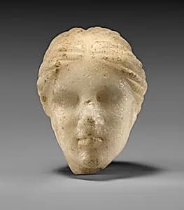 Marble head of Aphrodite? by Unknown Artist