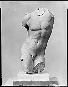 Marble torso of Eros by Praxiteles