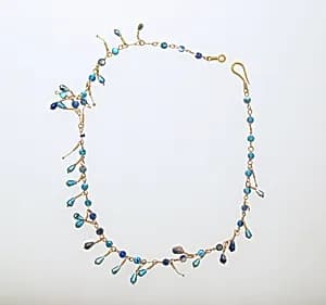 Necklace with blue beads by Unknown Artist
