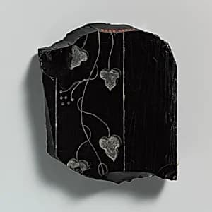 Obsidian revetment slab fragment by Unknown Artist