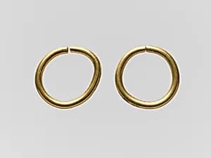 Pair of gold earrings by Unknown Artist