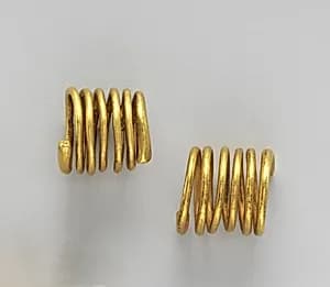 Pair of gold spirals by Unknown Artist