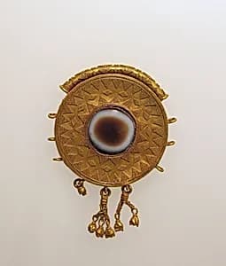 Pendant disc with bells by Unknown Artist
