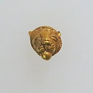 Pendant with lion's head by Unknown Artist