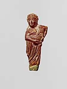 Pendant: woman carrying a child by Unknown Artist