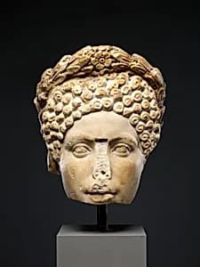 Portrait head of a woman by Unknown Artist
