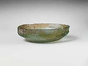 Ribbed glass bowl by Unknown Artist