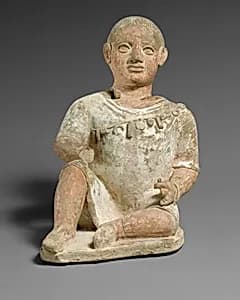 Seated boy by Unknown Artist