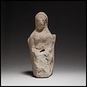 Seated female figurine by Unknown Artist