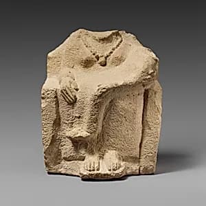 Seated limestone kourotrophos by Unknown Artist