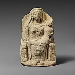 Seated limestone kourotrophos by Unknown Artist