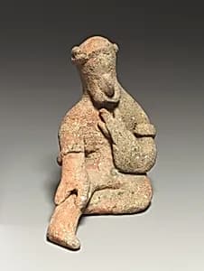 Seated male figurine by Unknown Artist