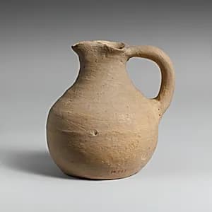 Small terracotta trefoil-mouthed jug by Unknown Artist