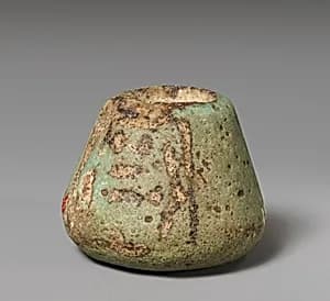 Spindle whorl by Unknown Artist