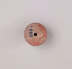 Spindle whorl by Unknown Artist