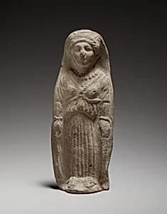 Standing female figurine by Unknown Artist