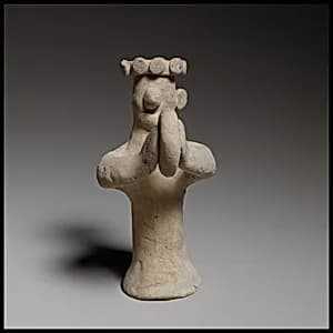 Standing tambourine player by Unknown Artist