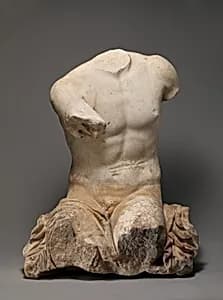 Statue of a seated man by Unknown Artist
