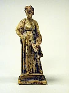 Statuette of a girl by Unknown Artist