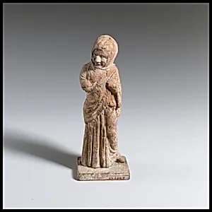 Statuette of an old woman by Unknown Artist
