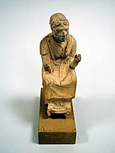 Statuette of an old woman by Unknown Artist