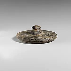 Stone lid of a pyxis by Unknown Artist