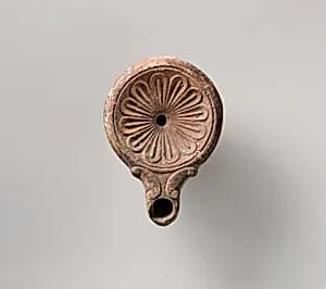 Tarracotta oil lamp by Unknown Artist