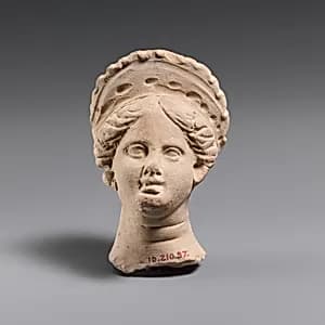 Terracotta female head by Unknown Artist