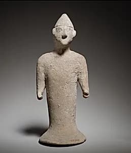 Terracotta figure of a man by Unknown Artist